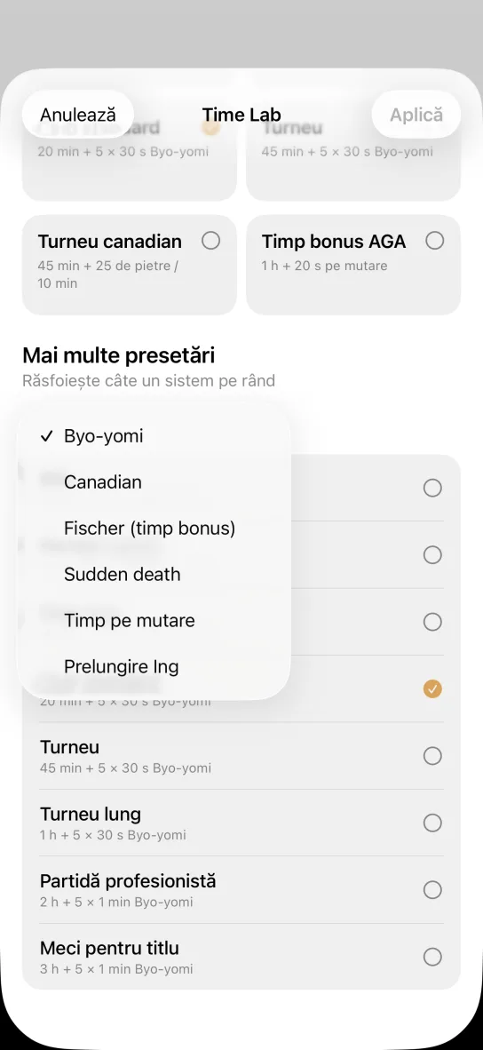 Meniul deschis al aplicației cu sistemele Byo-yomi, Canadian, Fischer (timp bonus), Sudden death, Timp pe mutare și Prelungire Ing, iar dedesubt presetările Turneu, Turneu lung, Partidă profesionistă și Meci pentru titlu.