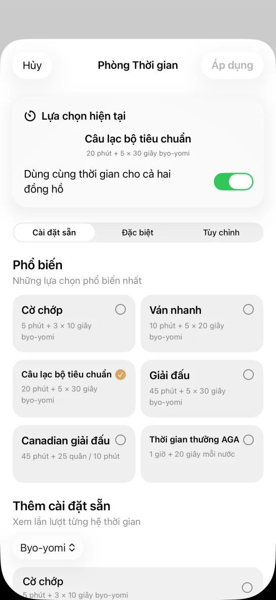Màn hình chọn cách tính giờ của ứng dụng: các thiết lập cờ vây như Blitz 5 phút + 3 × 10 giây, Chuẩn câu lạc bộ 20 phút + 5 × 30 giây, Giải đấu kiểu Canada 45 phút + 25 quân / 10 phút và Thời gian thưởng AGA 60 phút + 20 giây
